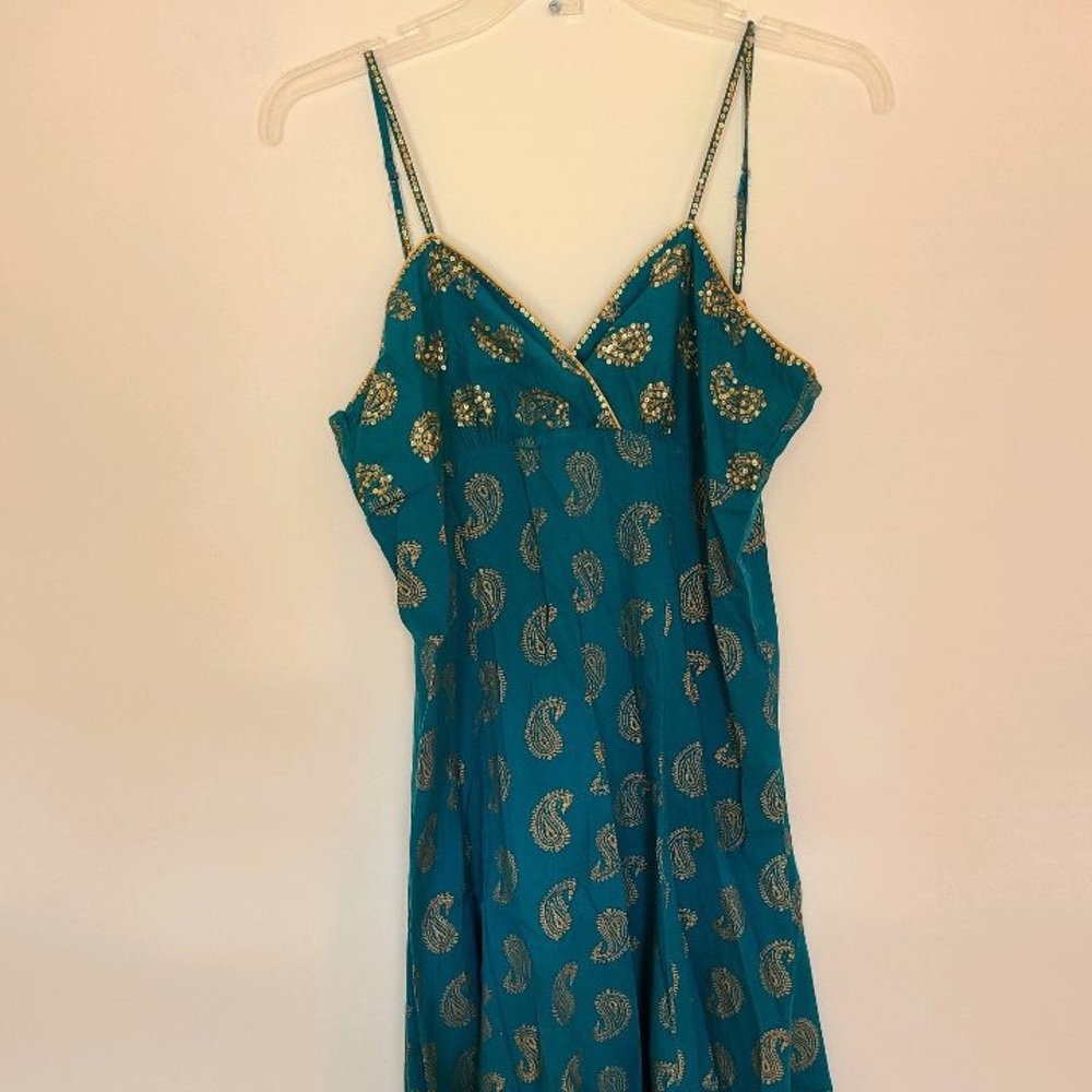 Small dress with sequins straps. Turquoise/green.